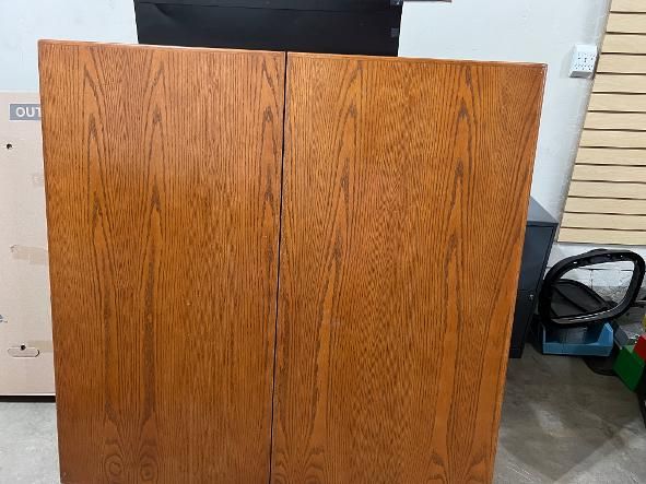 Whiteboard in foldable cabinet