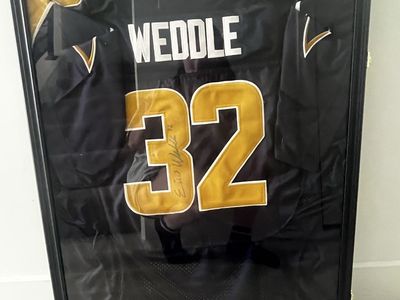 Signed Eric Weddel Rams Jersey