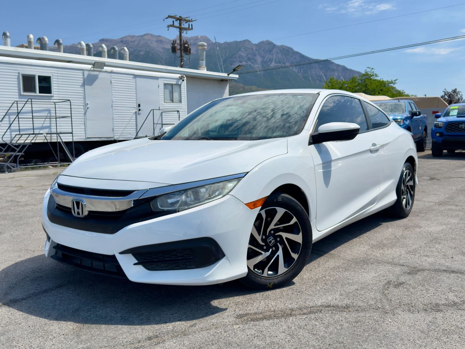 2018 Honda Civic LX — rebuilt & branded title, 26% below market