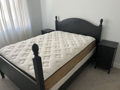 Queen Size Headboard, Side Rails, Footboard and Two Matching Nightstands.