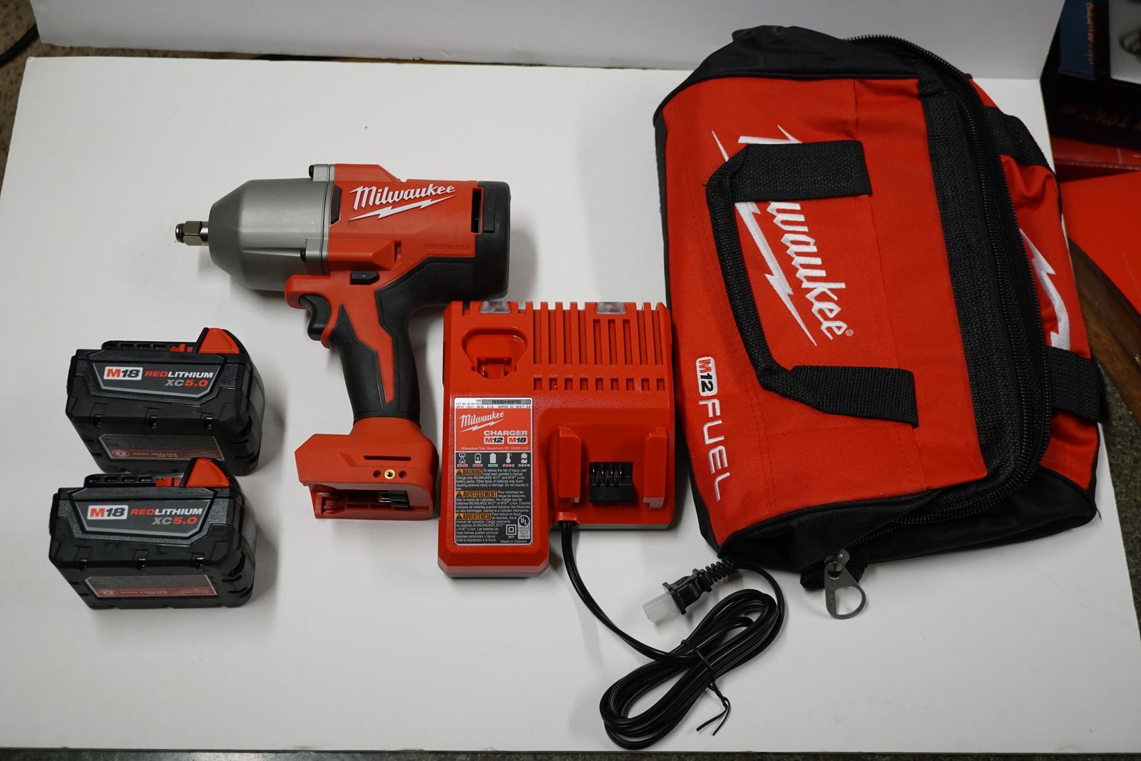 New Milwaukee M18 1/2 Inch Impact Wrench with Batteries, Charger, & Tool Bag