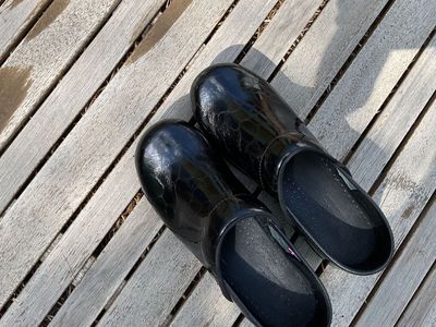 black glossy clogs