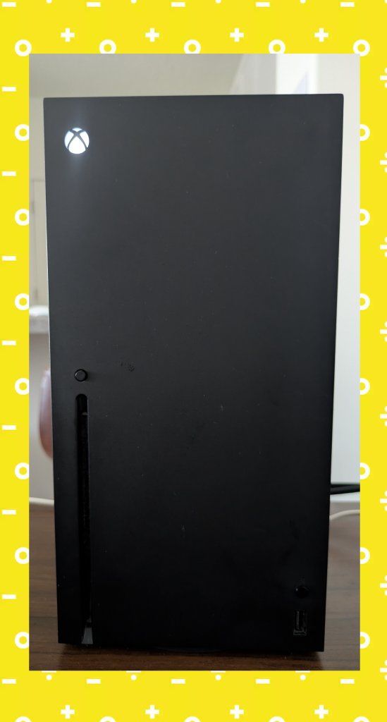 Microsoft Xbox Series X 1TB Console - Black and dust cover