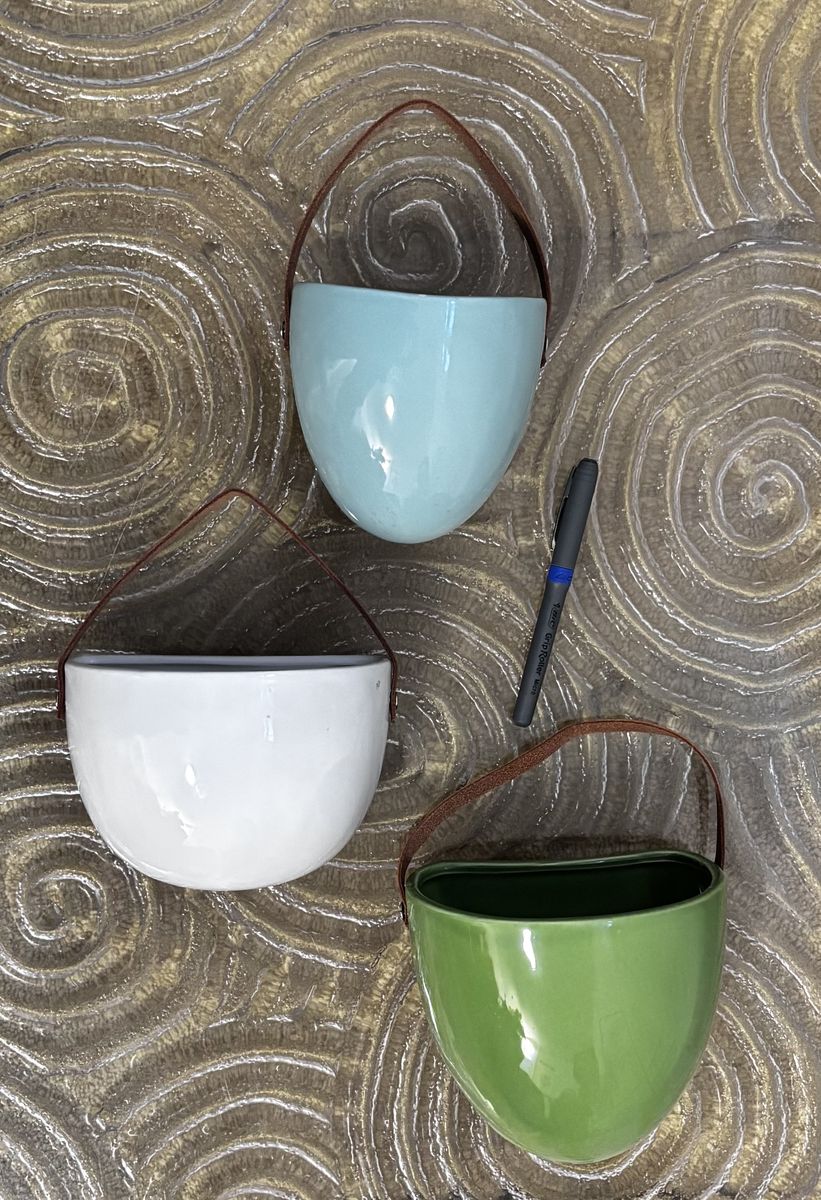 Three ceramic wall pockets