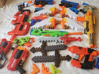 Large Nerf & Minecraft Toy Blaster Lot with Swords and Bows