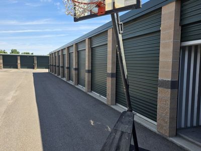 Portable Basketball Hoop with Adjustable Height and Base Wheels