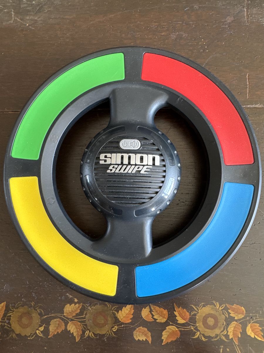 Simon Says Swipe Electronic Handheld Memory $10