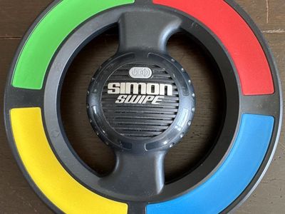 Simon Says Swipe Electronic Handheld Memory $10