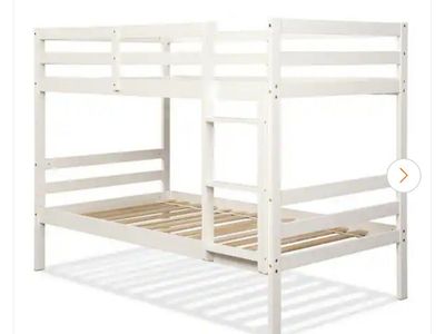 twin white wood bunk bed with ladder