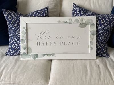 White & Green Eucalyptus 'This Is Our Happy Place' Wall Decor Sign.