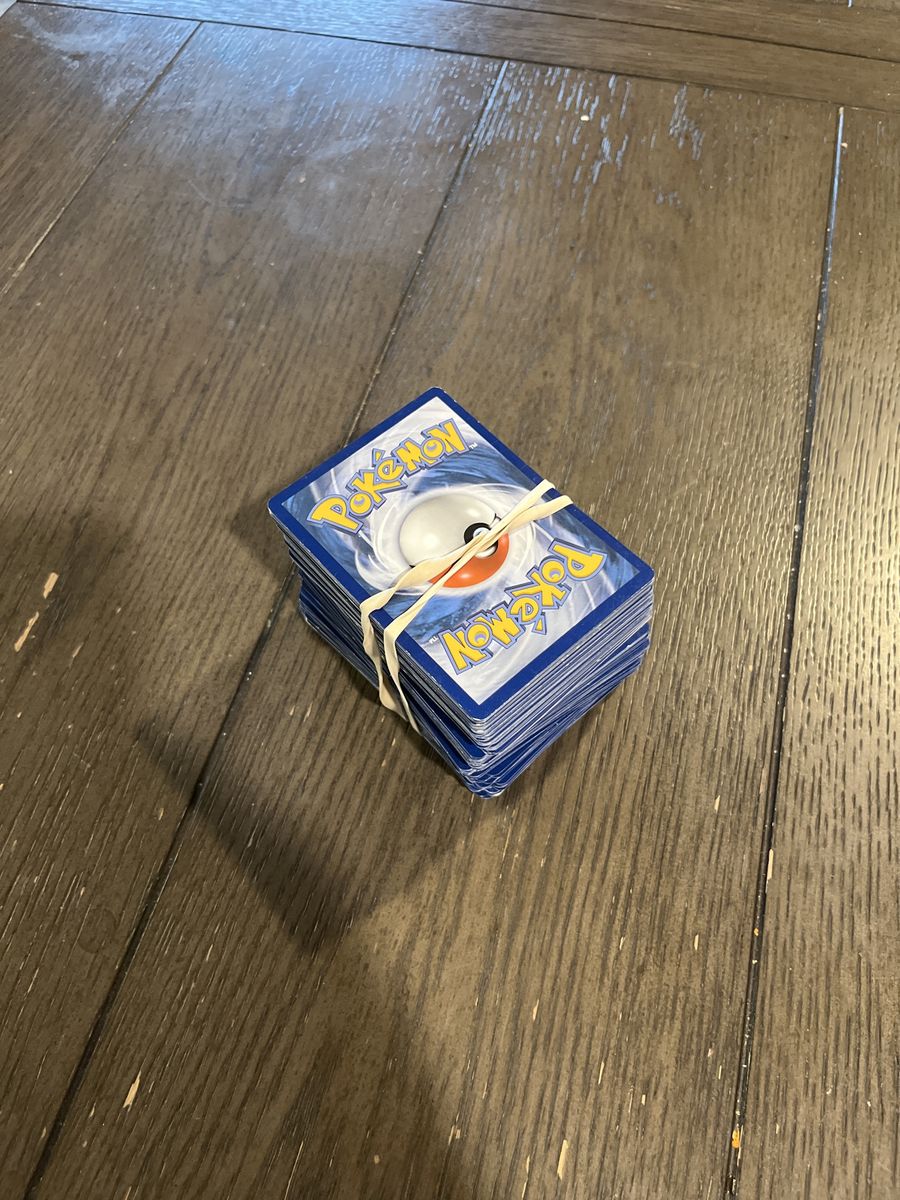 200 pokemon cards holo rares along with normal