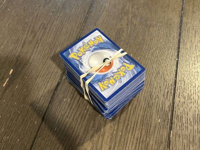 200 pokemon cards holo rares along with normal