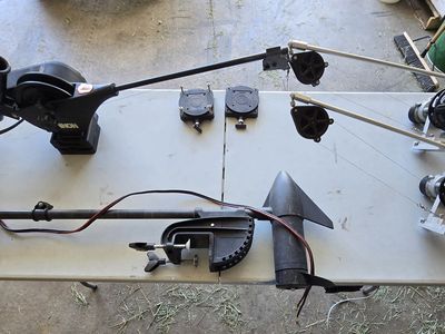 Downriggers and electric trolling motor