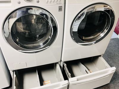 LG washer and dryer set with pedestals