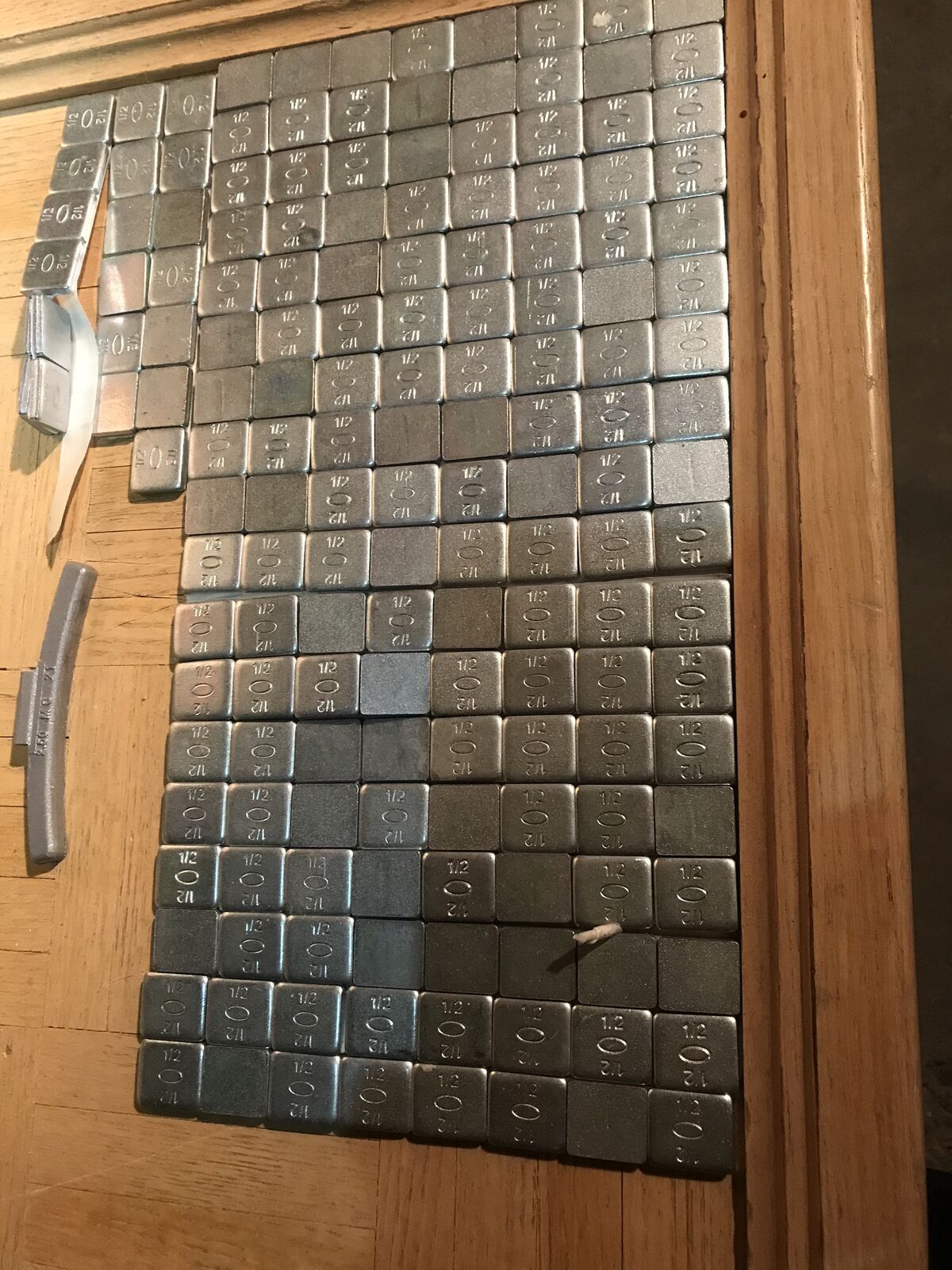 Self adhesive weights made for balancing tires  OR for other things just peel and stick