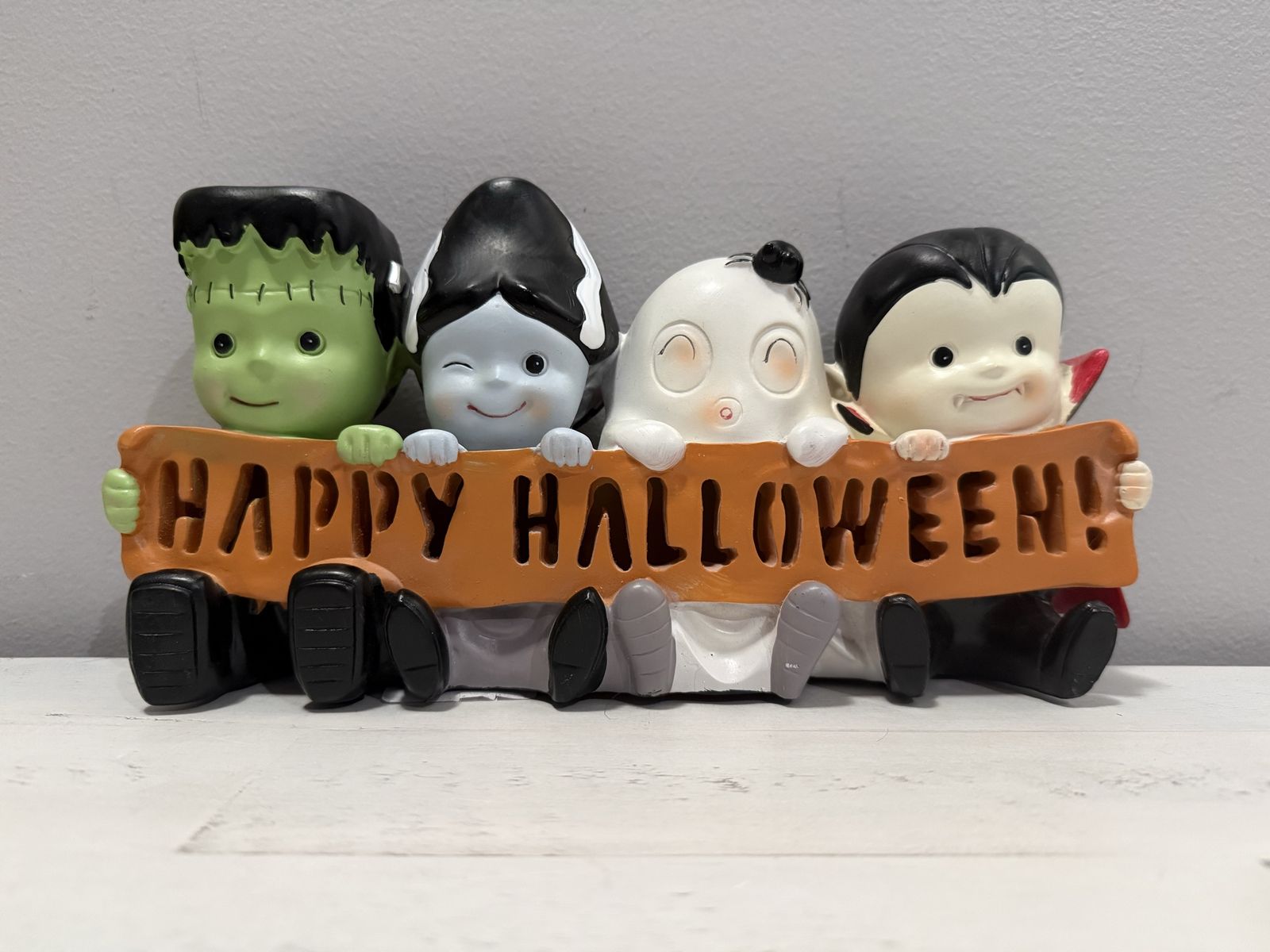 Halloween Decor Features Four Classic Monsters Frankenstein, Bride Of Frankenstein, Ghost & Dracula "Happy Halloween!" Lights Up