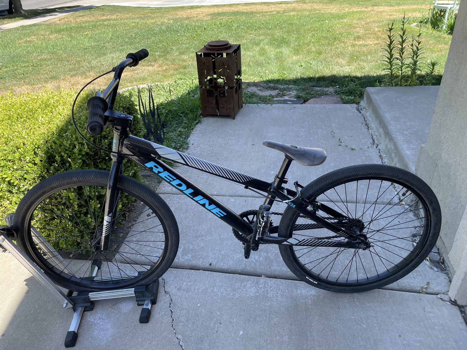 Redline MX24 BMX Race Bike - 24" cruiser, Black with Blue Accents