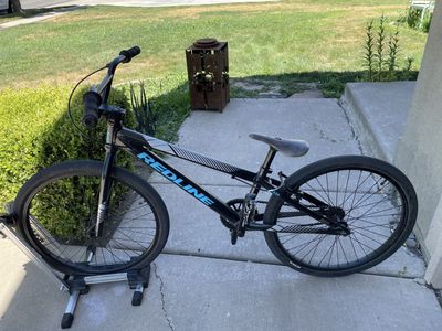 Redline MX24 BMX Race Bike - 24" cruiser, Black with Blue Accents