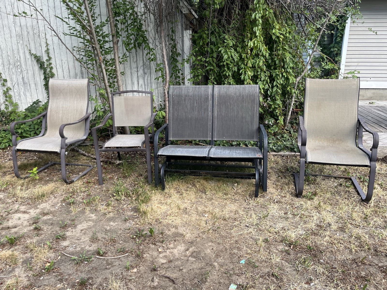 Patio Furniture Set: 2 Tan Sling Chairs & 1 Black Metal 2-Person Glider Bench