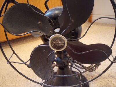 Antique fan, lamps, basket.