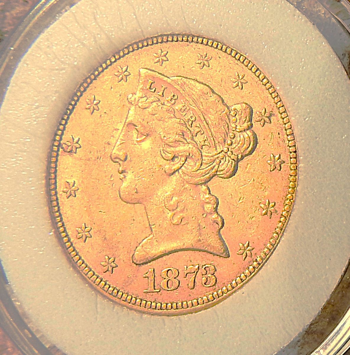 1873 $5. us gold  F-VF $1168. melt value
