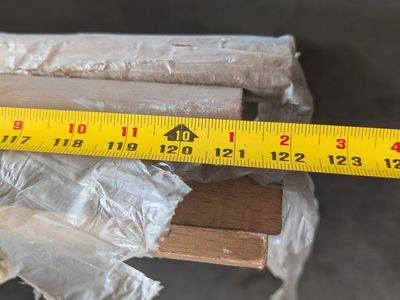 1 1/2" tall baseboard by 70 ft long