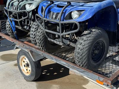 (2) 2005 Yamaha Bruin 250 Four Wheelers and Trailer