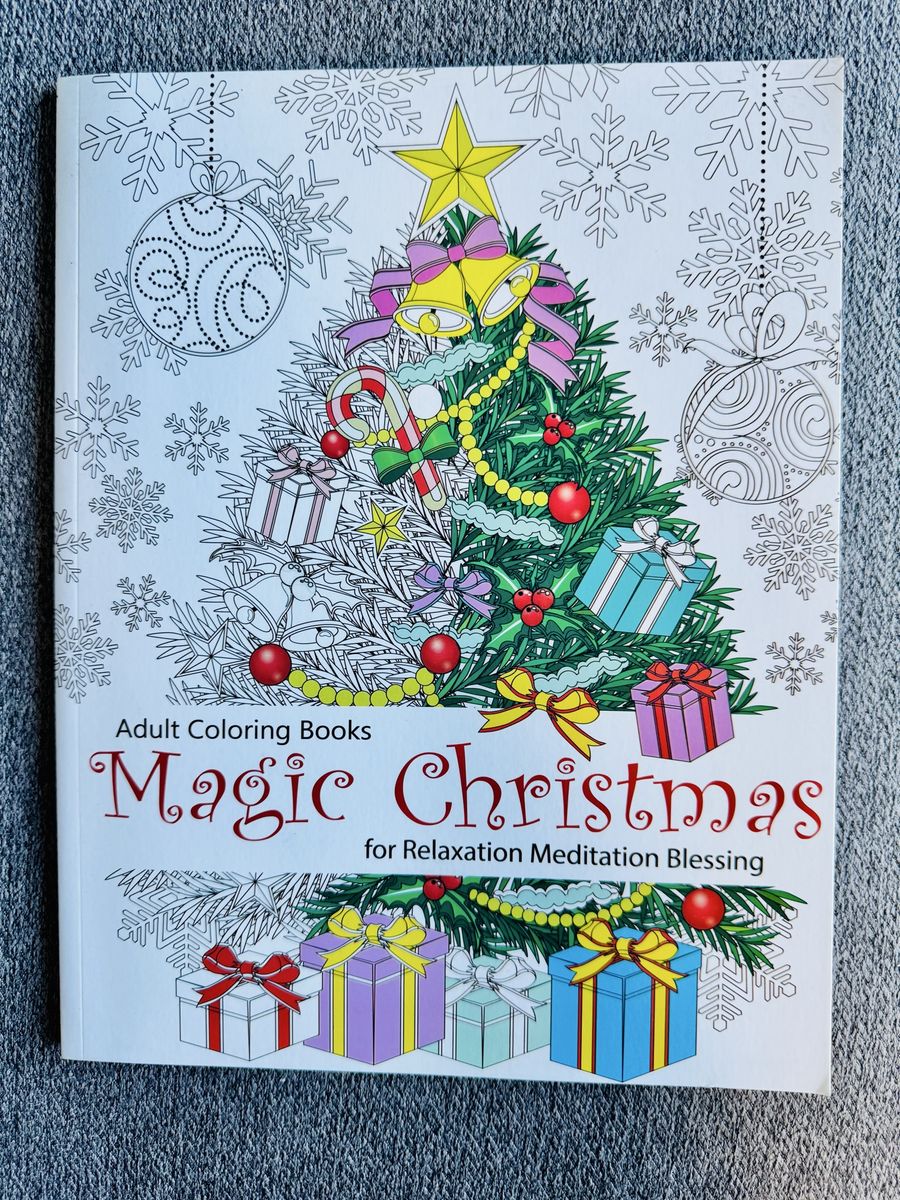 The "Magic Christmas" adult coloring book by Cherina Kohey, featuring 61 pages of holiday-themed designs.