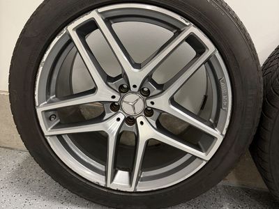 Mercedes Benz wheels with tires
