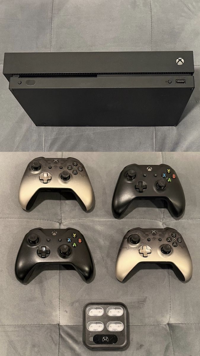 Xbox One X Console with 4 Controllers, Charging Dock, and 7 Games