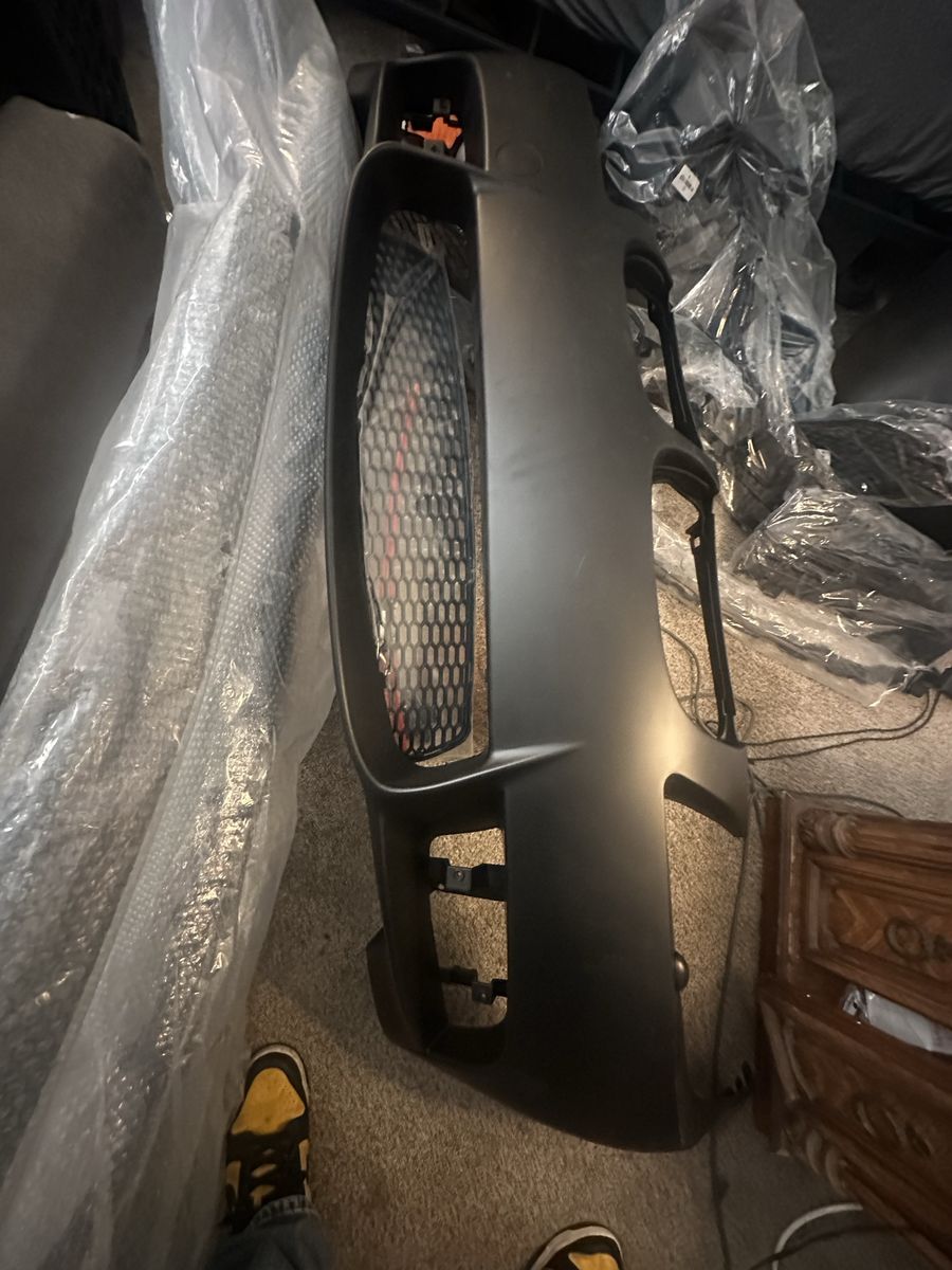 Aftermarket BMW E39 2008-2009 Front Bumper Cover with Grille Inserts and body kit
