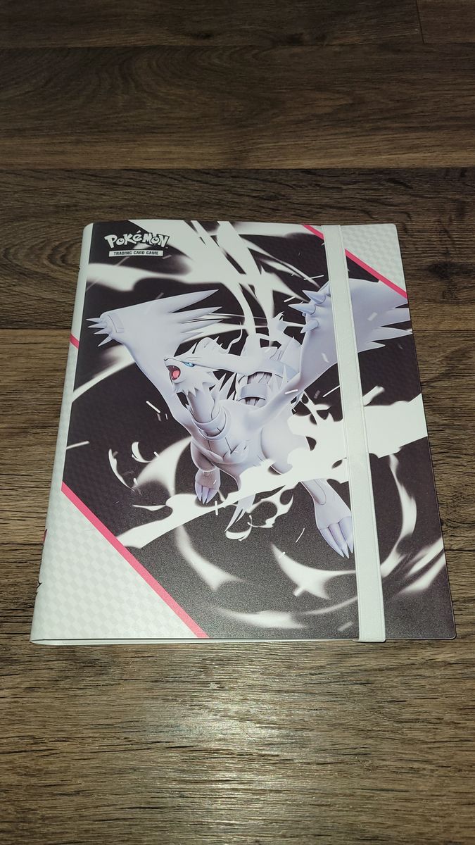 Pokemon binder with cards and accessories