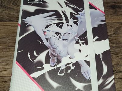Pokemon binder with cards and accessories