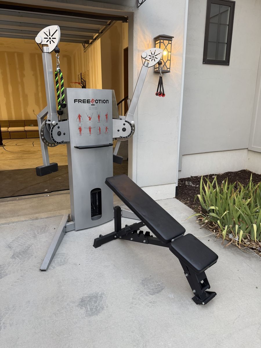 FreeMotion Commercial Functional Trainer w/ Adjustable Cable Arms, 100lb Stack & Bench and mats