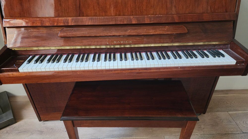 Free upright piano with bench