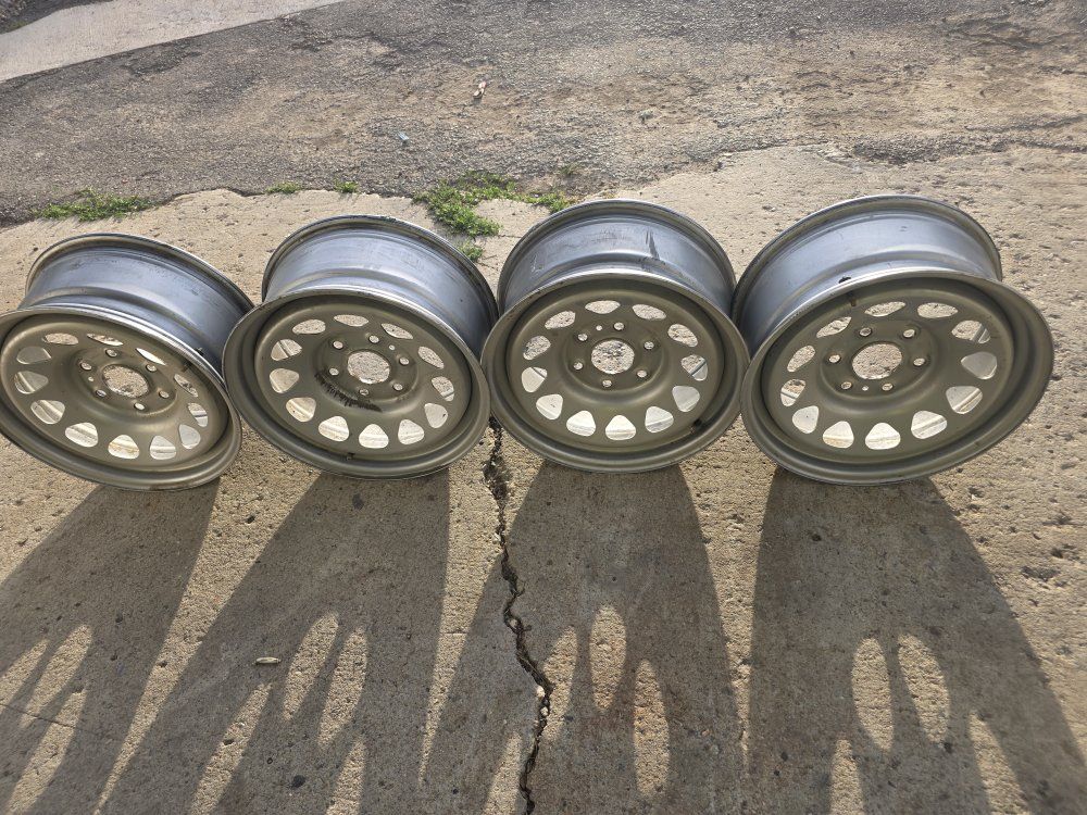 Set of 4 Silver Steel Wheels Rims - Used Condition chevy  gmc 6 bolts