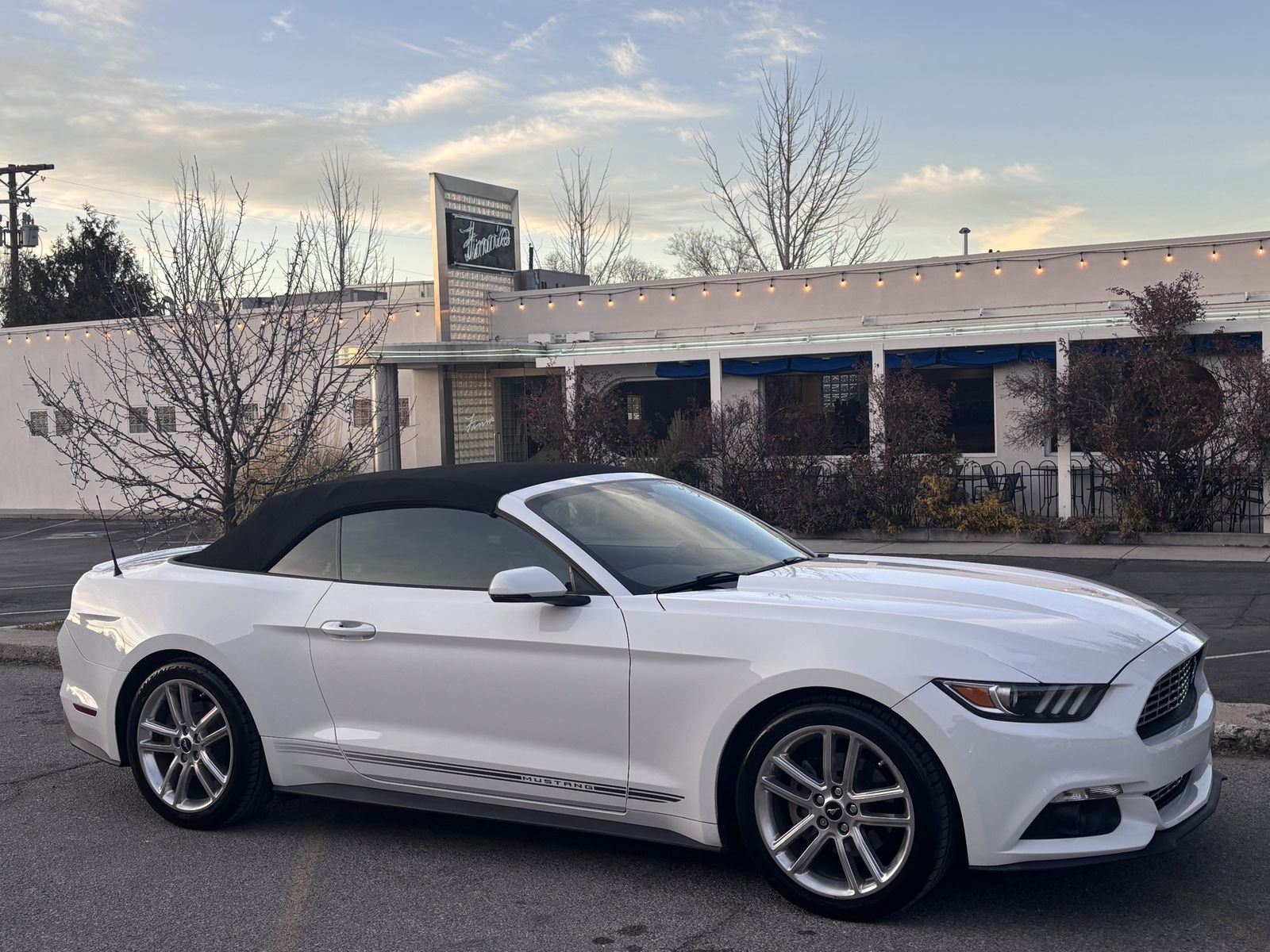 2017 Ford Mustang rims Set of four with lug nuts very nice looking just upgraded to black rims.
