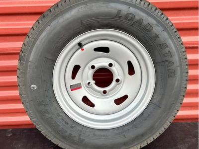 Selling as a Spare Brand New Load Star ST 185/80 R 13 Trailer Tires Mounted on New Silver Mod Wheel.