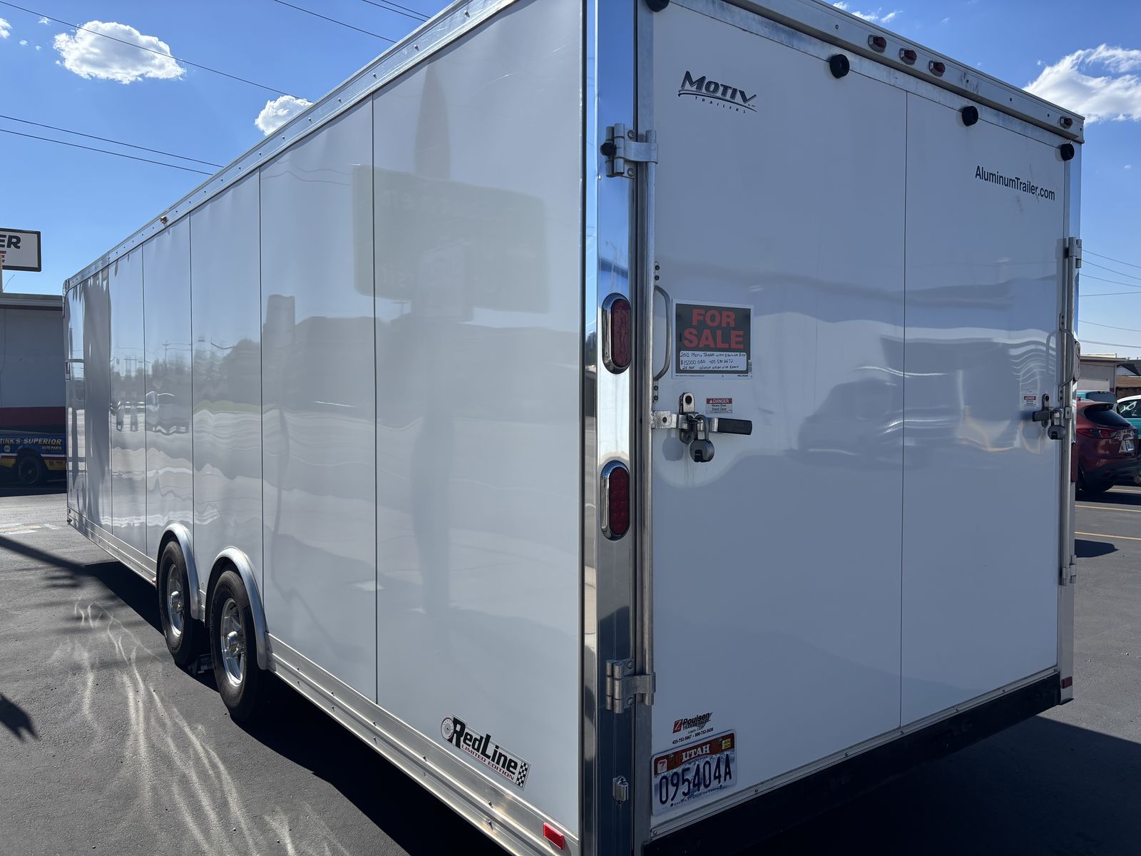 Motiv 28 foot enclosed tandem axel car trailer