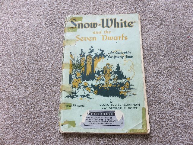 1916 PUBLICATION OF THE “SNOW WHITE AND THE SEVEN DWARFS” OPERETTA FOR YOUNG FOLKS” BOOK