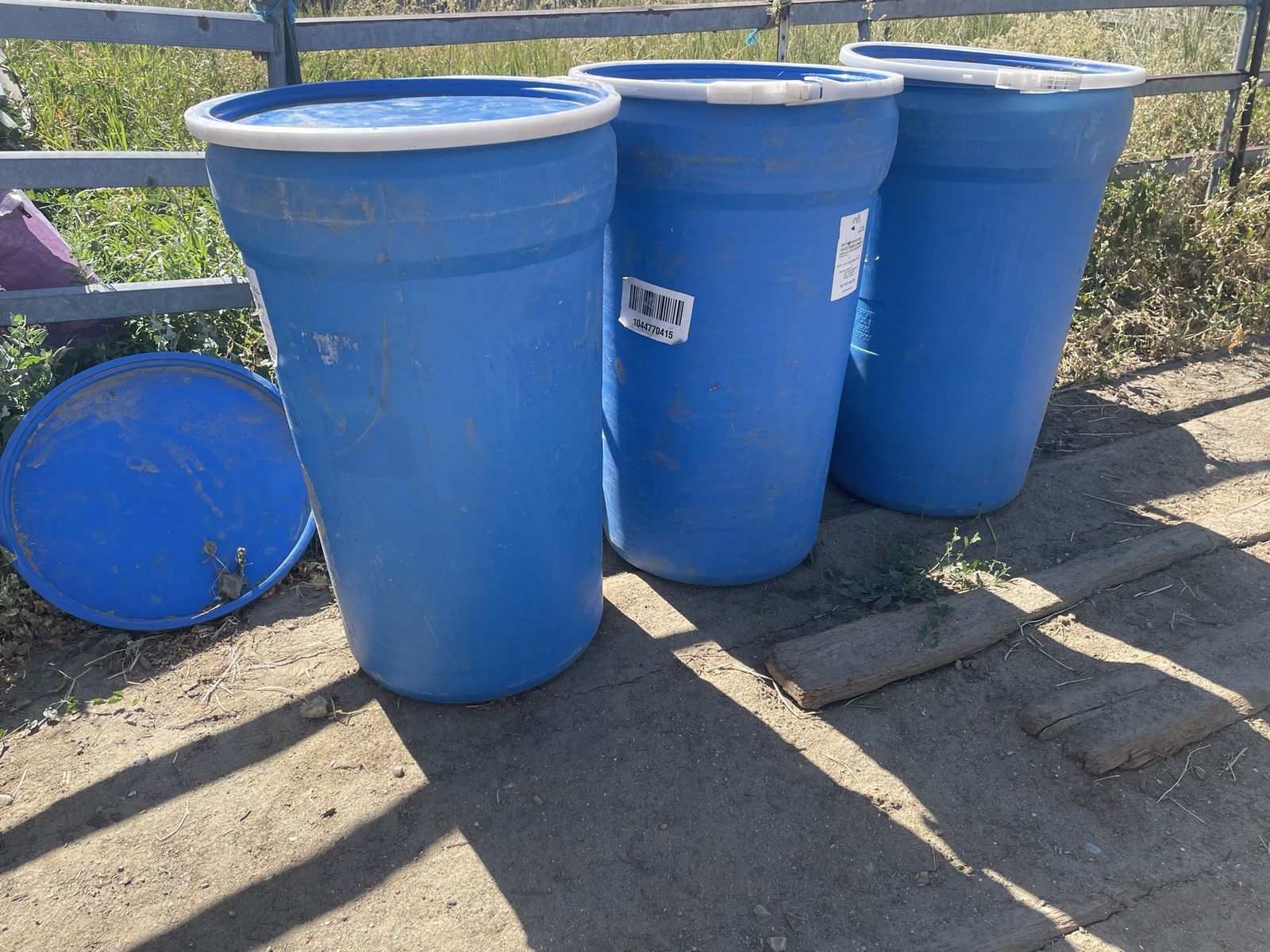 4 Used Blue Plastic 100 Gallon Barrels/Drums with Lids - Water/Storage