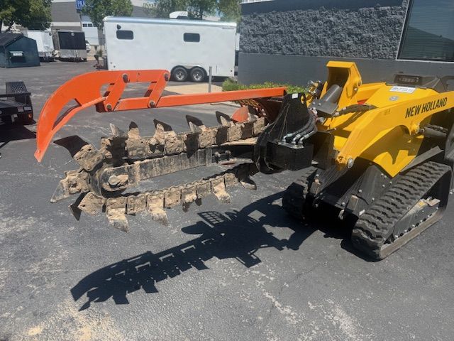 NEW HOLLAND C314 MINI SKID STEER W/ TRENCHER ATTACHMENT