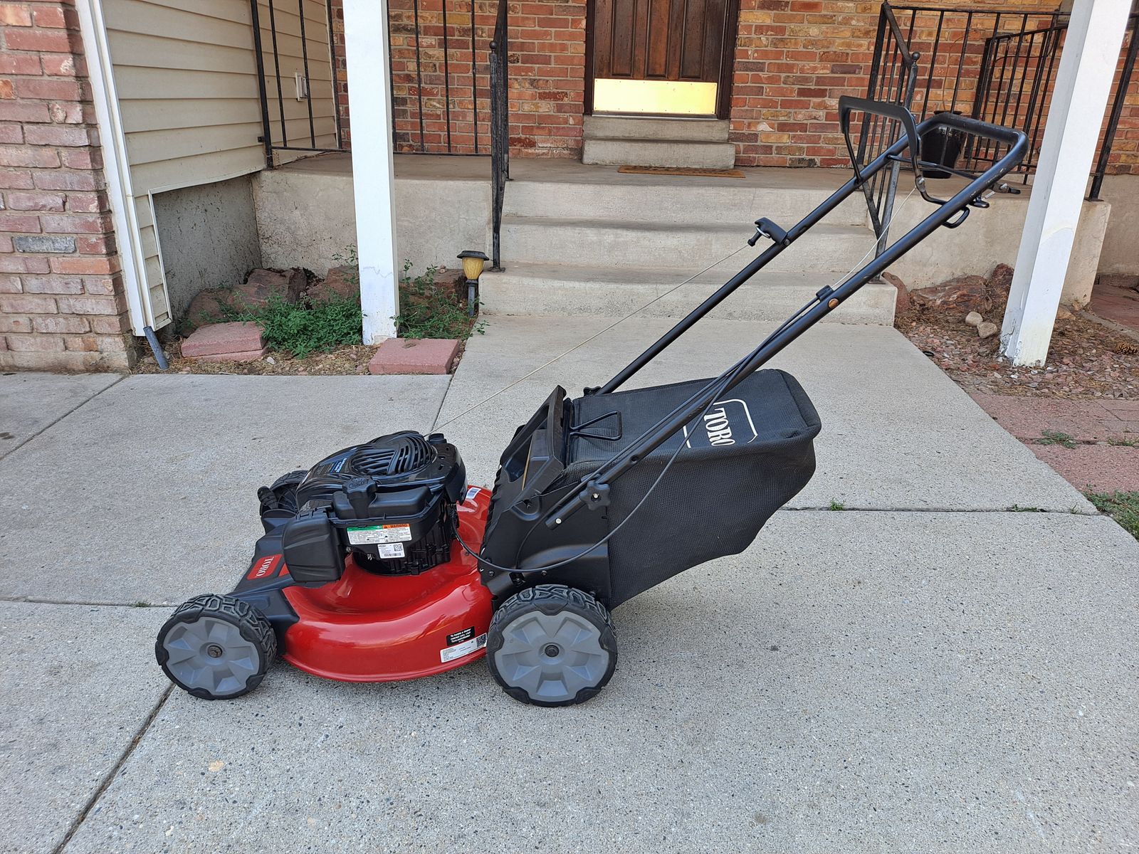 NEWER Toro rear wheel driver bagged mower, tuned