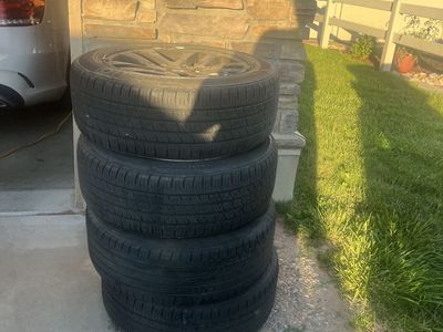 4 tires and wheels size 205/55/R16