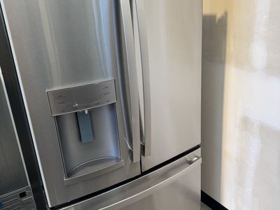 Scratch and dent/ floor model/ customer return GE - 36 in. Wide 22.1 Cu. Ft. French Door Counter-Depth Refrigerator
