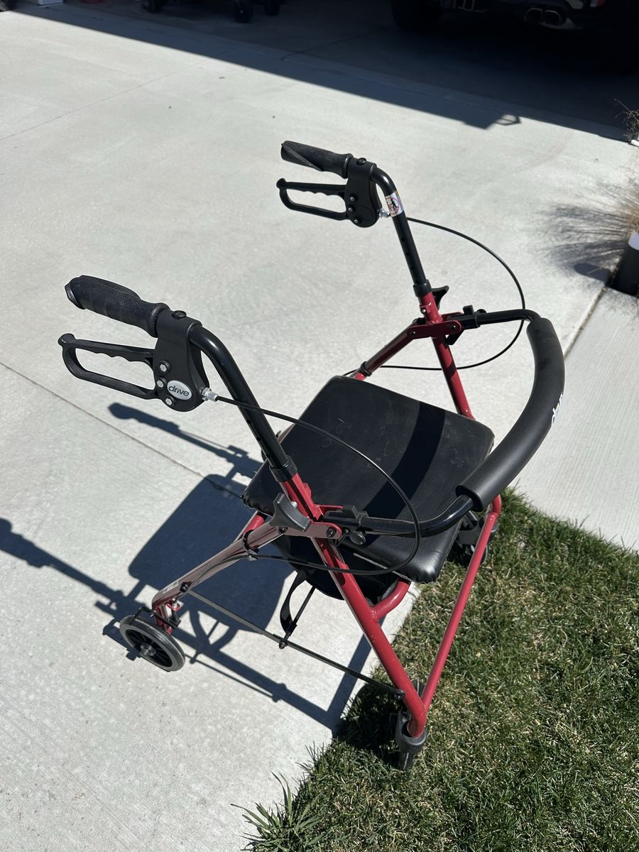 Walker With Seat And Brakes