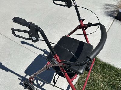 Walker With Seat And Brakes