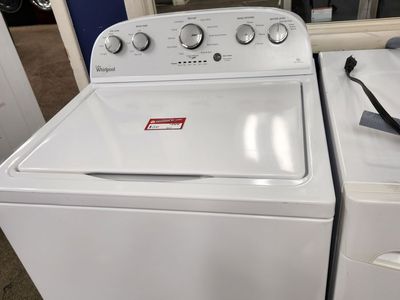 NICE WHIRLPOOL TOPLOAD WASHER! WITH A FULL WARRANTY