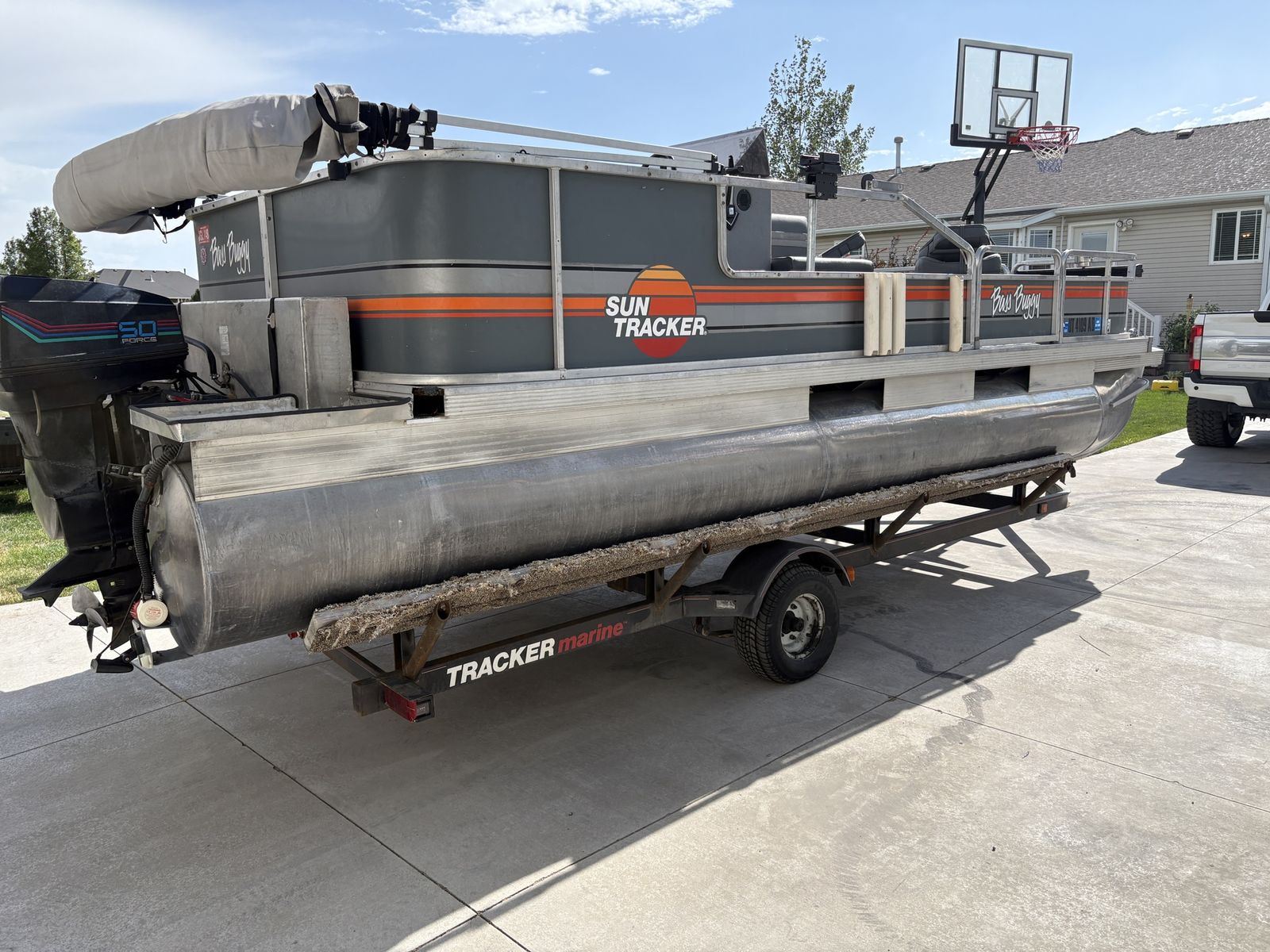 1988 Bass Buggy by Sun Tracker pontoon boat.