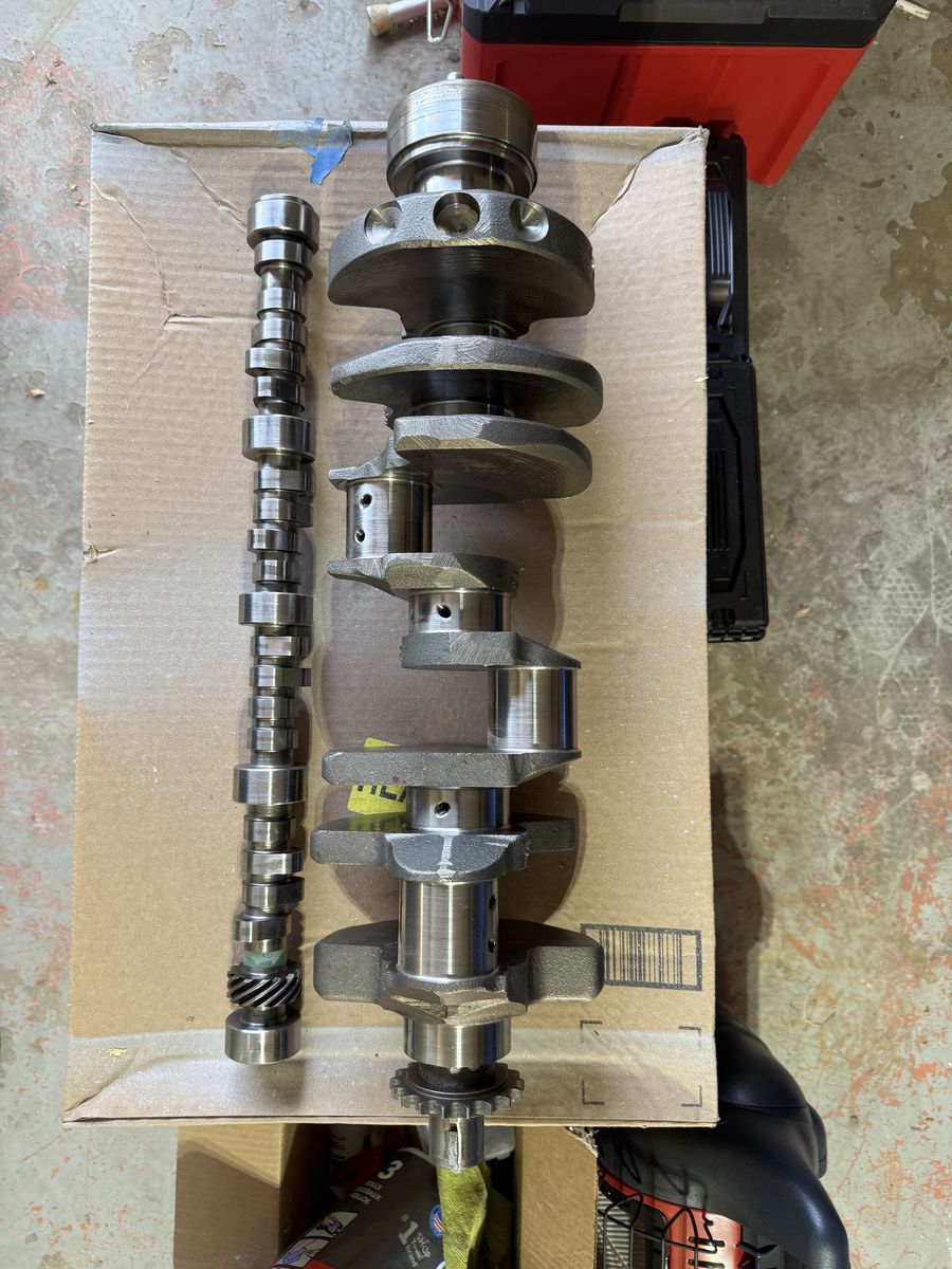 Chevy 305 heads, crank, cam, pistons, rods.